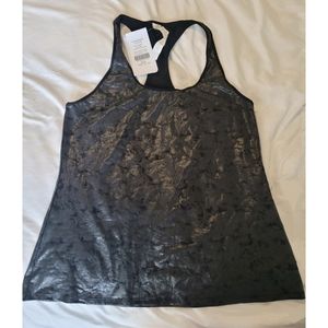 Brand new shiny black active tank